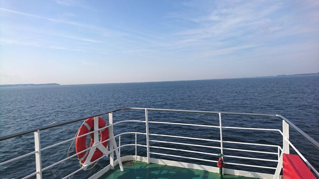 A view of Tokyo Bay from the deck of a ship