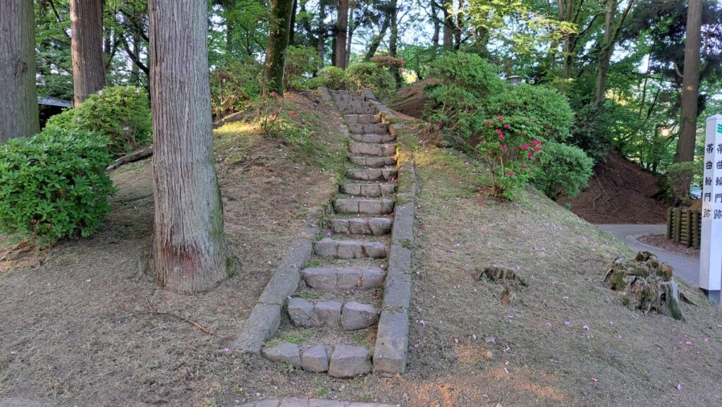 A narrow staircase on a low hill
