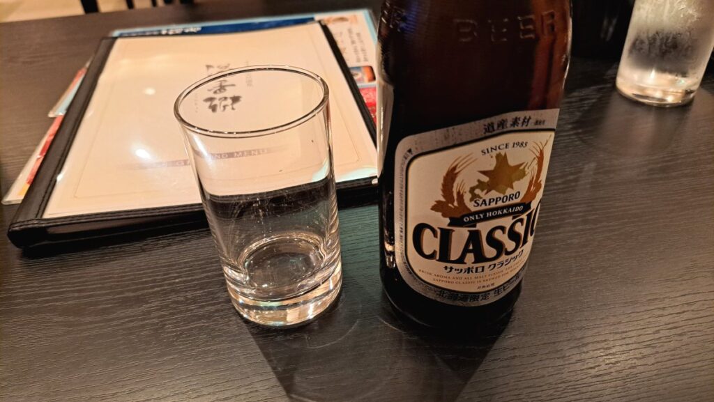A glass of Sapporo Classic after a bath.
