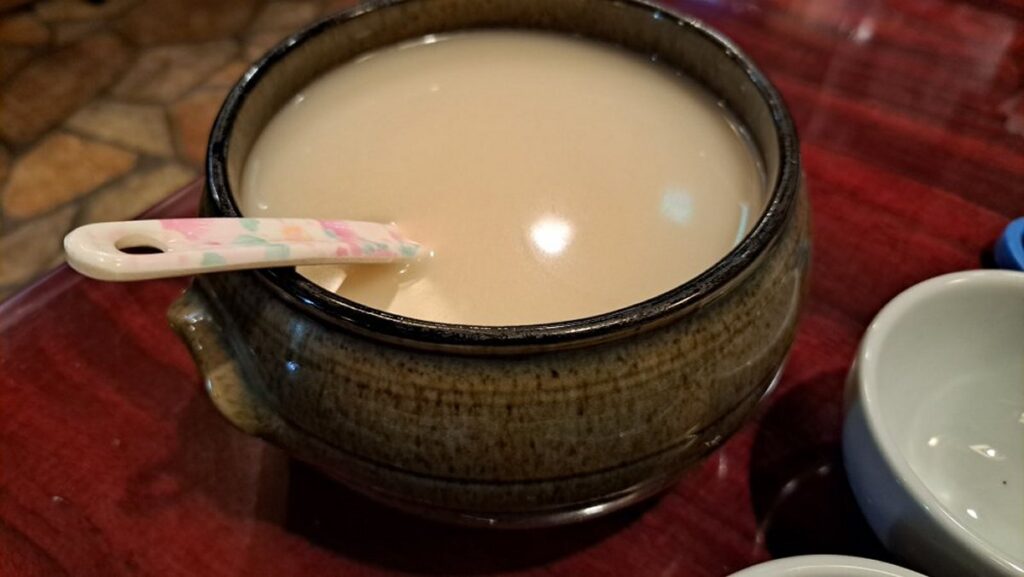 Makgeolli served in a bottle