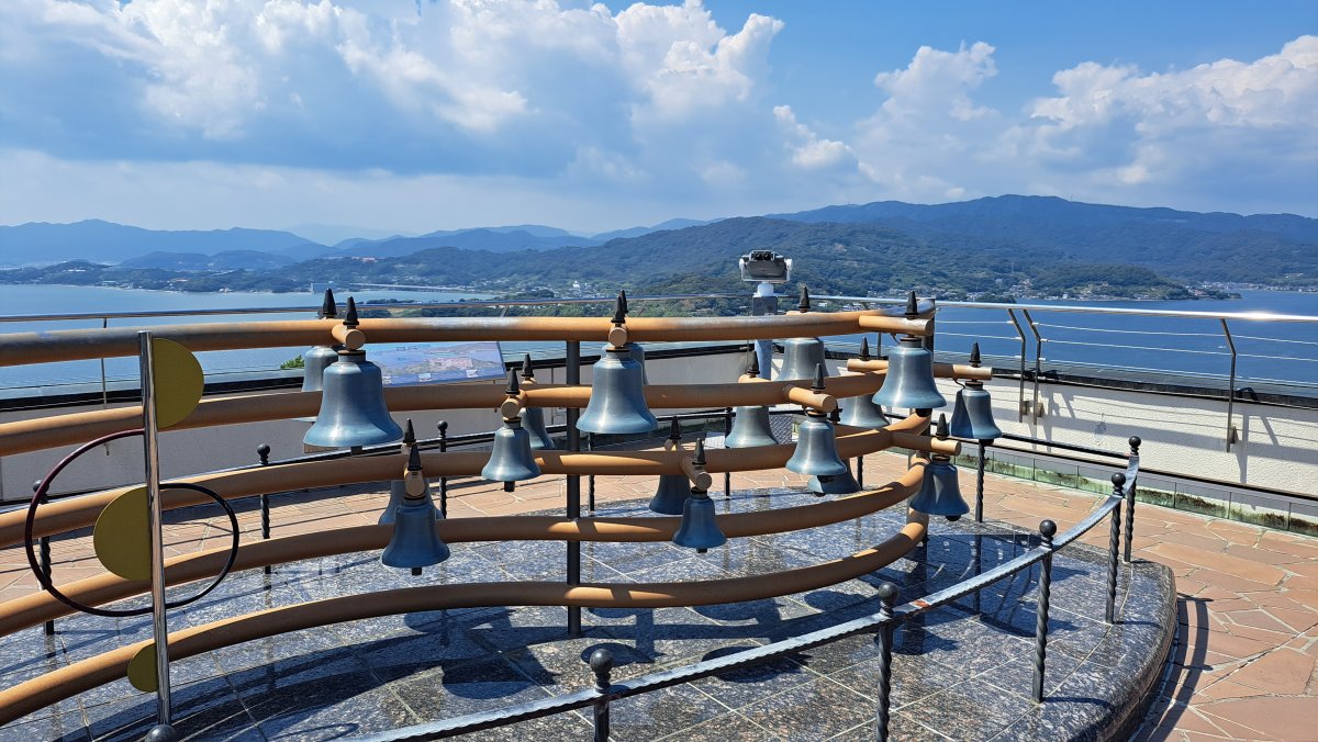 The observation deck's bell and the stunning view of Lake Hamana