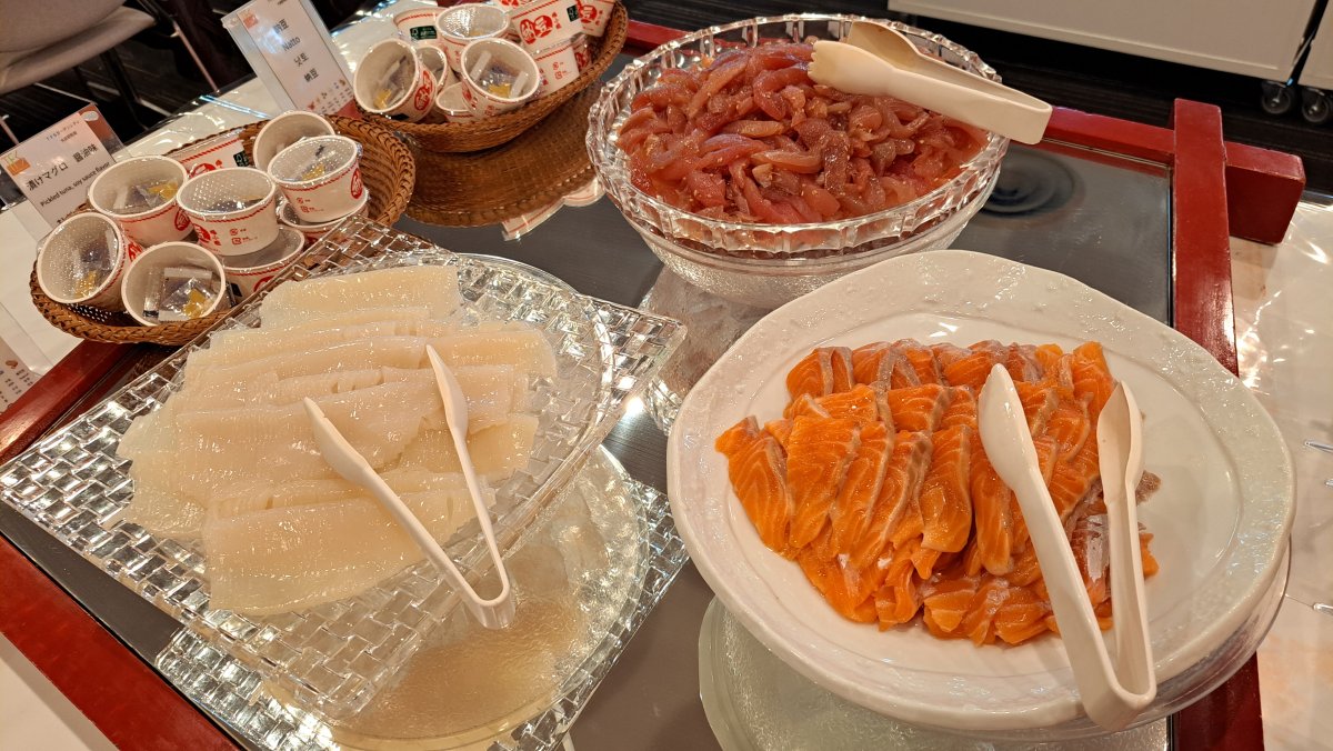 Tuna, salmon, and squid sashimi