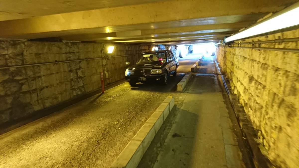 A taxi passing through the haunted tunnel.