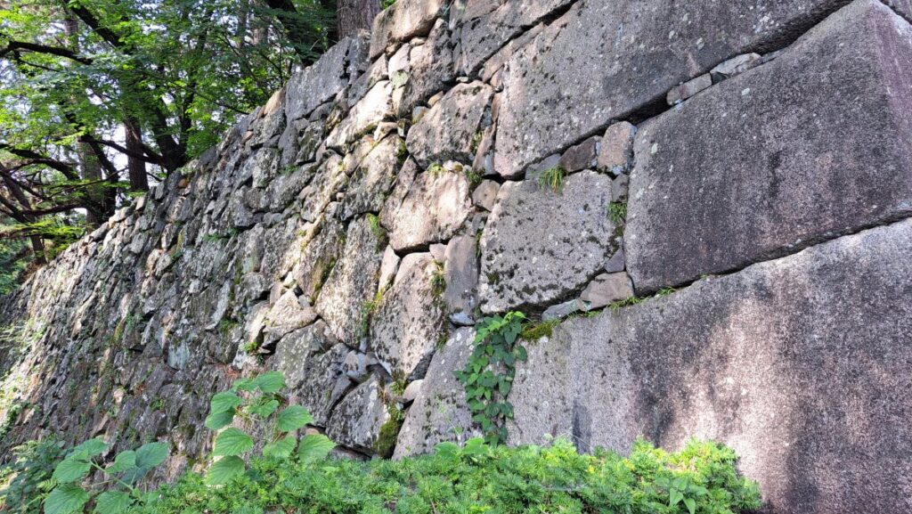 The "stone walls" that support the formidable defenses of Nagoya Castle.