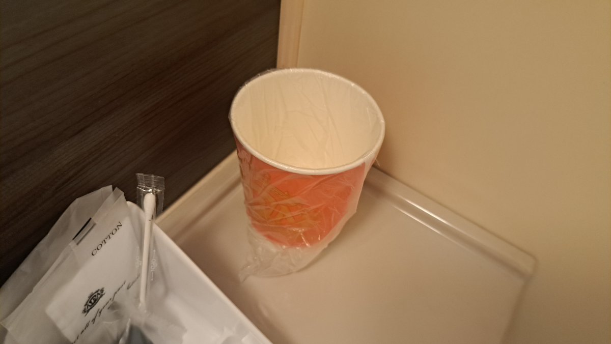 The toothbrushing cup is a paper cup.