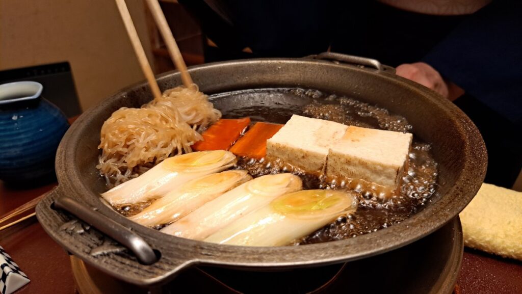 Vegetables and tofu thoroughly infused with dashi broth.
